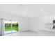 Modern kitchen with white cabinets, stainless steel appliances and island at 3145 Novara Ln, Lakewood Ranch, FL 34211