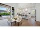 Open concept with bar seating and kitchen, great flow to outdoor living spaces at 1783 Bayview Dr, Sarasota, FL 34239
