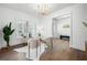 Bright home office featuring a modern desk, natural light, and elegant furnishings for a productive workspace at 1783 Bayview Dr, Sarasota, FL 34239