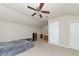 Upstairs bedroom with window seat and ceiling fan at 5919 Lexington Dr, Parrish, FL 34219