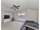 Spacious bedroom with large window and ceiling fan at 5919 Lexington Dr, Parrish, FL 34219