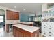 Modern kitchen with stainless steel appliances and an island at 5919 Lexington Dr, Parrish, FL 34219