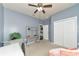 Spacious bedroom with double closet and an additional workspace at 5919 Lexington Dr, Parrish, FL 34219