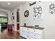 Elegant entryway with hardwood floors and decorative wall accents at 5919 Lexington Dr, Parrish, FL 34219