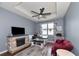 Cozy Gathering room featuring a stone fireplace, built-in bench seating, and hardwood floors at 5919 Lexington Dr, Parrish, FL 34219