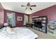 Primary bedroom with large bed and ample storage at 5919 Lexington Dr, Parrish, FL 34219