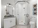 Modern bathroom with a glass shower and white vanity at 1783 Bayview Dr, Sarasota, FL 34239