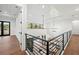 Open floorplan showcasing kitchen, living, and dining areas with pool view at 1783 Bayview Dr, Sarasota, FL 34239