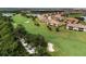 Aerial view of the property and surrounding golf course community at 13822 Messina Loop # 101, Bradenton, FL 34211