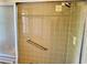 Large shower with tiled walls and grab bar at 3553 Syracuse St, Port Charlotte, FL 33952