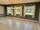 Bright dining room with tile floors and large windows at 3553 Syracuse St, Port Charlotte, FL 33952