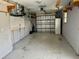 Spacious garage with extra storage and shelving at 3553 Syracuse St, Port Charlotte, FL 33952