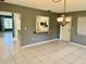 Open dining area with view into kitchen and living room at 3553 Syracuse St, Port Charlotte, FL 33952
