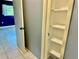 Open shelving unit in a closet for additional storage at 3553 Syracuse St, Port Charlotte, FL 33952