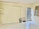 Laundry room with exterior access and shelving at 3553 Syracuse St, Port Charlotte, FL 33952