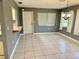 Dining area with tile floors and access to backyard at 3553 Syracuse St, Port Charlotte, FL 33952
