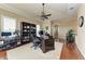 Spacious home office with large desk and hardwood floors at 4713 Mainsail Dr, Bradenton, FL 34208