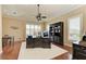 Bright home office features built-in shelving and hardwood floors at 4713 Mainsail Dr, Bradenton, FL 34208