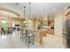 Gourmet kitchen with granite countertops and stainless steel appliances at 4713 Mainsail Dr, Bradenton, FL 34208