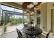 Enjoy meals in this outdoor kitchen with pool access at 4713 Mainsail Dr, Bradenton, FL 34208