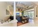 Spacious living room with a sectional sofa and built-in entertainment center at 4713 Mainsail Dr, Bradenton, FL 34208