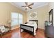 Bright bedroom with a comfortable bed and large window at 4713 Mainsail Dr, Bradenton, FL 34208