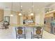 Spacious kitchen with granite countertops, stainless steel appliances, and an island at 4713 Mainsail Dr, Bradenton, FL 34208