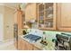 Kitchen features gas cooktop, stainless steel appliances, and wood cabinets at 4713 Mainsail Dr, Bradenton, FL 34208