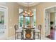 Charming breakfast nook with bay window and seating for four at 4713 Mainsail Dr, Bradenton, FL 34208