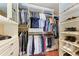 Large walk-in closet with ample shelving and hanging space at 4713 Mainsail Dr, Bradenton, FL 34208