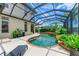 Relaxing pool and spa with covered patio at 4713 Mainsail Dr, Bradenton, FL 34208