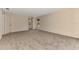 Spacious carpeted bedroom with ample natural light and an ensuite bathroom at 3530 Adelaide Ave, North Port, FL 34288