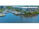Waterfront community with boat slips and lush landscaping at 1260 Dolphin Bay Way # 203, Sarasota, FL 34242