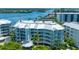 Three-story building with waterfront views and balconies at 1260 Dolphin Bay Way # 203, Sarasota, FL 34242