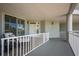 Private balcony with seating area, perfect for relaxing at 1260 Dolphin Bay Way # 203, Sarasota, FL 34242