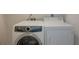 Convenient laundry room with washer and dryer included at 1260 Dolphin Bay Way # 203, Sarasota, FL 34242