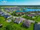 This aerial view showcases the property's prime location on a cul-de-sac near a lake, enhancing its desirability at 2352 Marton Oak Blvd, North Port, FL 34289