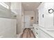 Modern bathroom with gray tile shower, white cabinets, sleek fixtures, and a neutral color scheme for a spa-like feel at 2352 Marton Oak Blvd, North Port, FL 34289