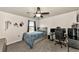 This functional bedroom has room for sleeping and gaming, with a comfortable bed and plenty of light at 2352 Marton Oak Blvd, North Port, FL 34289