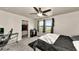 Comfortable bedroom featuring a walk-in closet, desk, and large window for plenty of light at 2352 Marton Oak Blvd, North Port, FL 34289