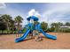 Community playground featuring a blue slide and climbing structure for fun and recreation at 2352 Marton Oak Blvd, North Port, FL 34289