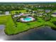 Aerial view of community pool and surrounding area at 2352 Marton Oak Blvd, North Port, FL 34289