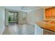 Bright open floorplan with access to the screened lanai, granite countertops, and tile floors at 4751 Travini Circle # 4-116, Sarasota, FL 34235
