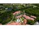 Community view showing condo location near pool and lake at 4751 Travini Circle # 4-116, Sarasota, FL 34235