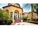 Community center building with landscaping at 4751 Travini Circle # 4-116, Sarasota, FL 34235