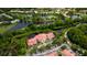 Aerial view of condo with water access, highlighting its desirable location at 4751 Travini Circle # 4-116, Sarasota, FL 34235
