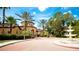 Community center with fountain and palm trees at 4751 Travini Circle # 4-116, Sarasota, FL 34235
