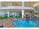 Soothing hot tub nestled in a tranquil courtyard with waterfall feature at 915 Seaside Dr # 606 Weeks 12-13, Sarasota, FL 34242