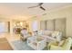 Open living room and dining area with neutral tones and stylish furniture at 915 Seaside Dr # 606 Weeks 12-13, Sarasota, FL 34242