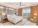 King-size bed, large windows, and private balcony access at 915 Seaside Dr # 606 Weeks 12-13, Sarasota, FL 34242